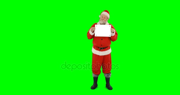 Santa claus holding blank board — Stock Video