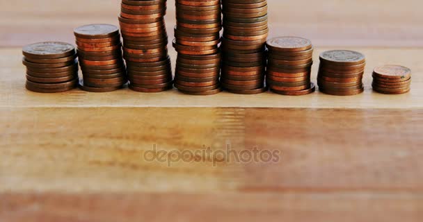 Stack of coins on table — Stock Video