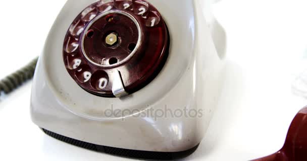Old telephone and smartphone — Stock Video
