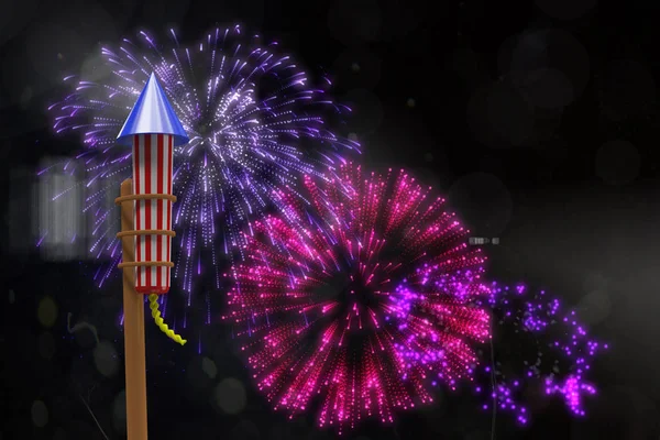 Raket voor vuurwerk tegen kleurrijke vuurwerk — Stockfoto