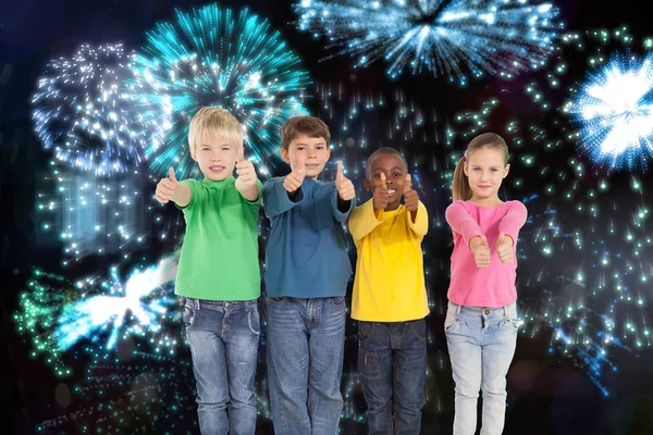 Cute kids showing thumbs up — Stock Photo, Image