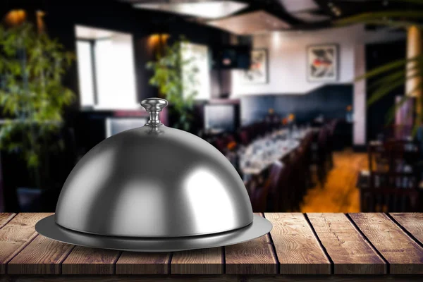 Serving platter against restaurant interior — Stock Photo, Image
