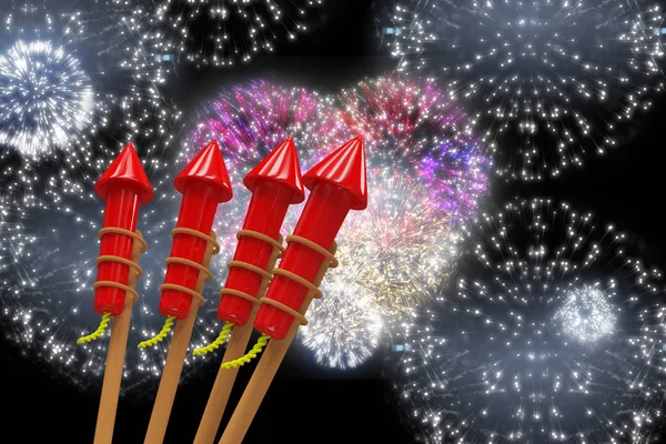 Raketten voor vuurwerk tegen kleurrijke vuurwerk — Stockfoto