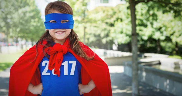 Masked girl pretending to be superhero — Stock Photo, Image