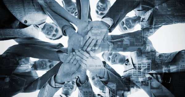 Business team standing in circle hands together — Stock Photo, Image