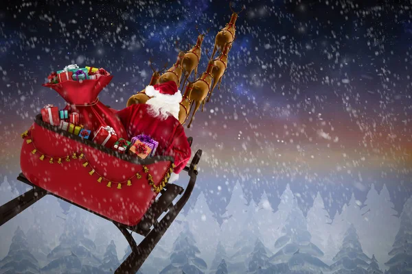 Santa Claus montando en trineo durante la Navidad —  Fotos de Stock