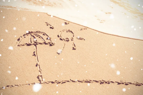 Zon en een paraplu getrokken op zand — Stockfoto