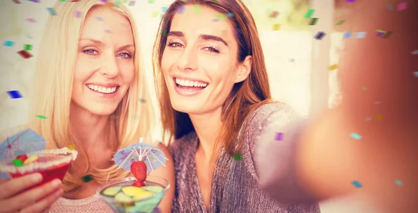 Women taking selfie with mobile phone — Stock Photo, Image