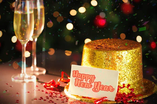 Gelukkig nieuwjaarskaart op goud hoed — Stockfoto