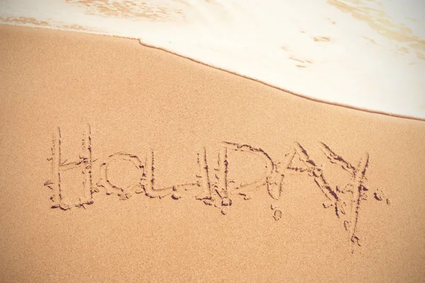 Tekst wakacje na piasku na plaży — Zdjęcie stockowe