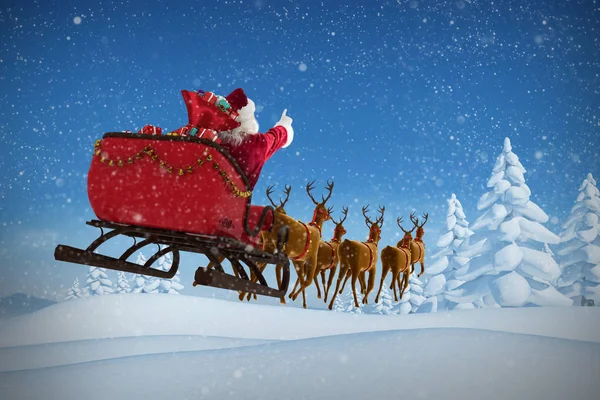 Санта Клаус катается на санях с подарочными коробками — стоковое фото