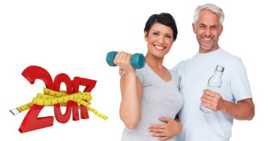 fit couple with dumbbell and water clipart