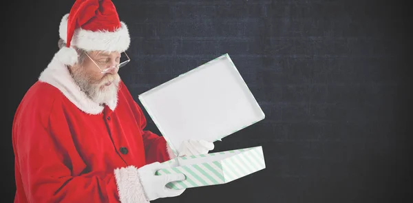 Santa claus öppna presentbox — Stockfoto