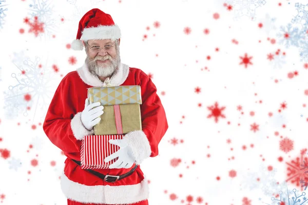 Babbo Natale tenendo regali di Natale — Foto Stock
