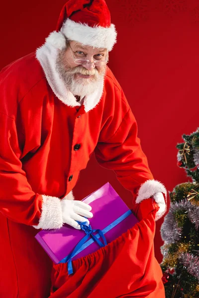 Santa claus s vánoční dárky — Stock fotografie