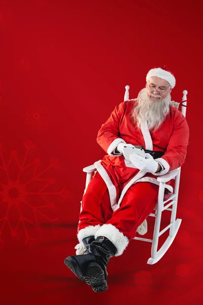 Санта-Клаус с помощью цифровой планшет — стоковое фото