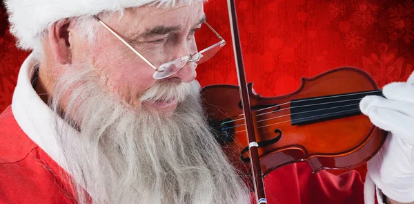 Kerstman spelen viool — Stockfoto