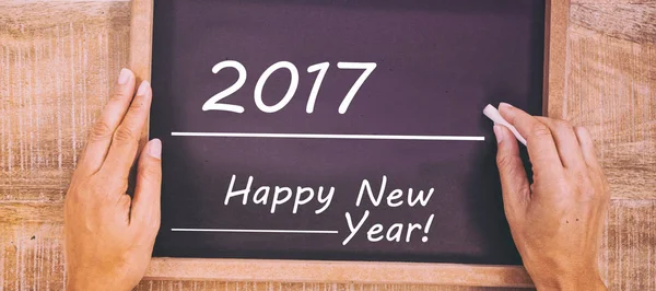 Černá deska s novoroční text — Stock fotografie