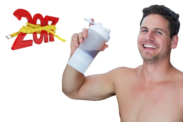 Bodybuilder holding flask — Stock Photo, Image