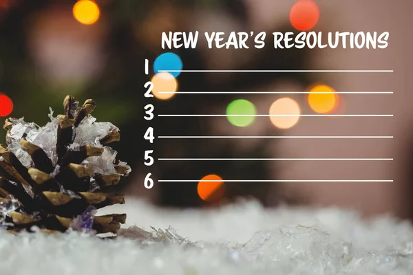 新しい年の解像度リストとパイン コーン — ストック写真