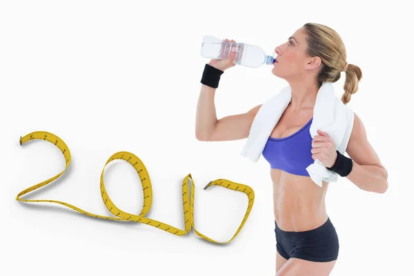 Strong blonde drinking from water bottle — Stock Photo, Image