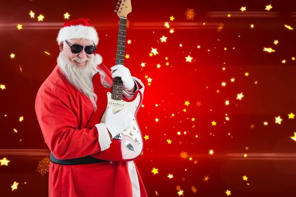 Babbo Natale suonare una chitarra — Foto Stock