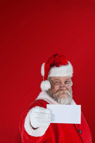 Santa Claus bedrijf blanco papier — Stockfoto