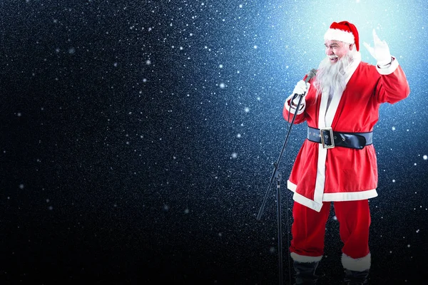 Santa claus singing christmas songs — Stock Photo, Image