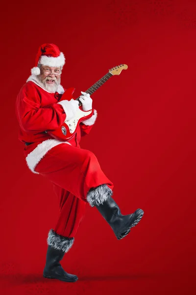 Santa claus playing guitar — Stock Photo, Image