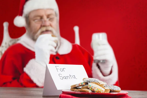Soubory cookie a santa doložka — Stock fotografie