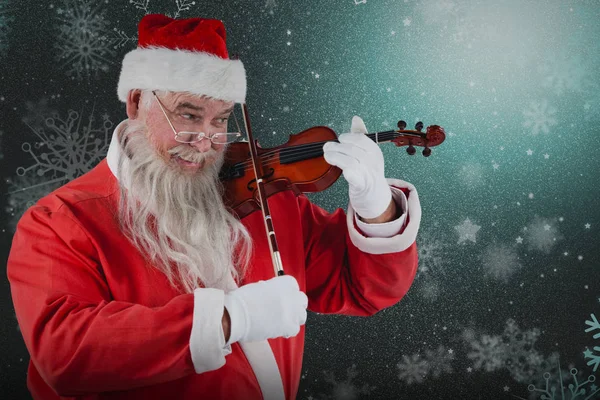 Usmíval se santa claus hrají housle — Stock fotografie