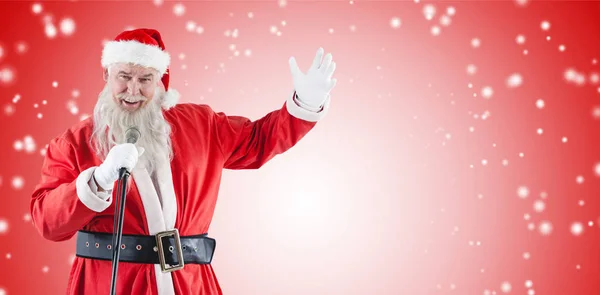 Santa claus singing christmas songs — Stock Photo, Image