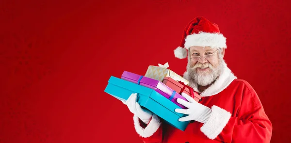 Santa claus christmas houden presenteert — Stockfoto