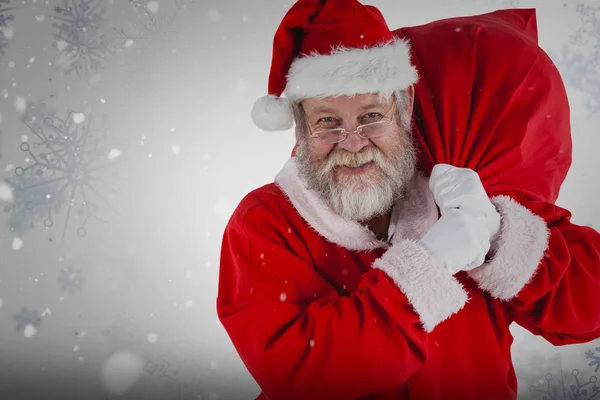 Papai Noel segurando saco de Natal — Fotografia de Stock