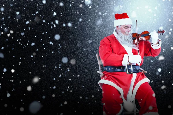 Babbo Natale suonare il violino — Foto Stock