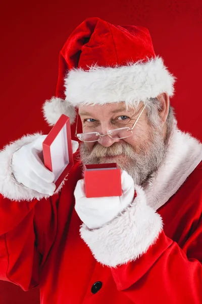 Santa claus otevírání krabičky — Stock fotografie