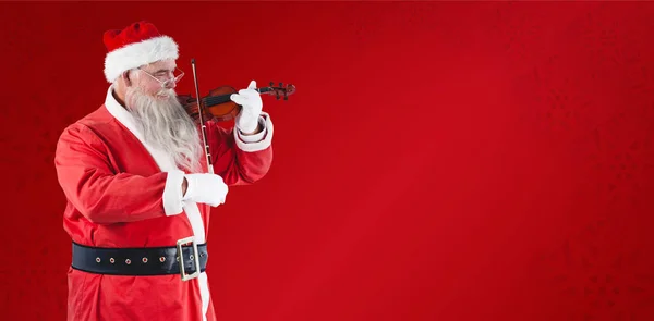 Happy santa claus playing violin — Stock Photo, Image