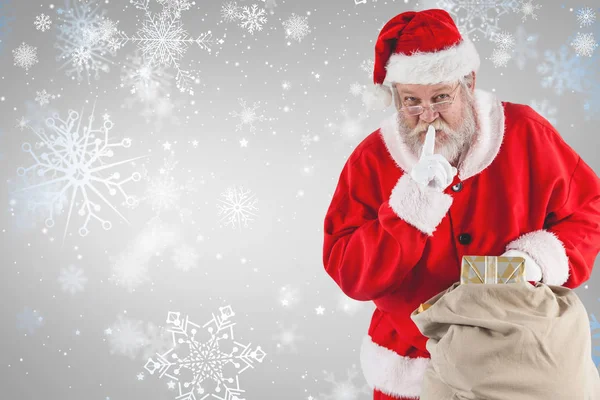 Papá Noel con dedo en los labios — Foto de Stock