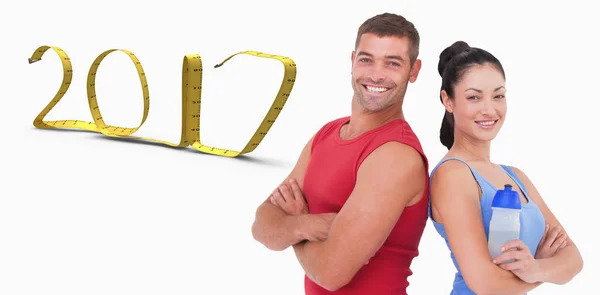 Fit man and woman smiling — Stock Photo, Image