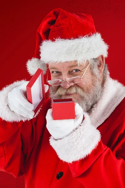 Santa claus otevírání krabičky — Stock fotografie
