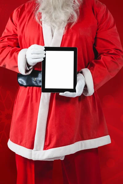 Дед Мороз показывает цифровой планшет — стоковое фото