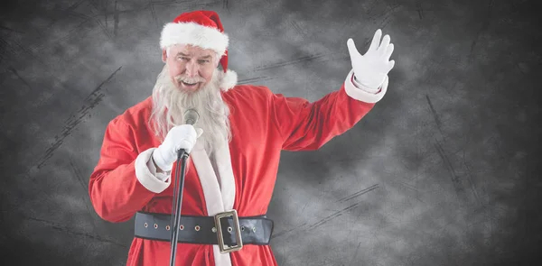 Santa claus zpěv vánočních písní — Stock fotografie