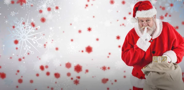 Papá Noel con dedo en los labios —  Fotos de Stock