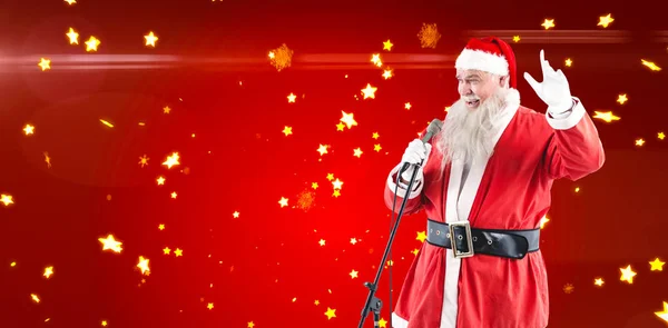 Santa claus śpiewa kolędy — Zdjęcie stockowe