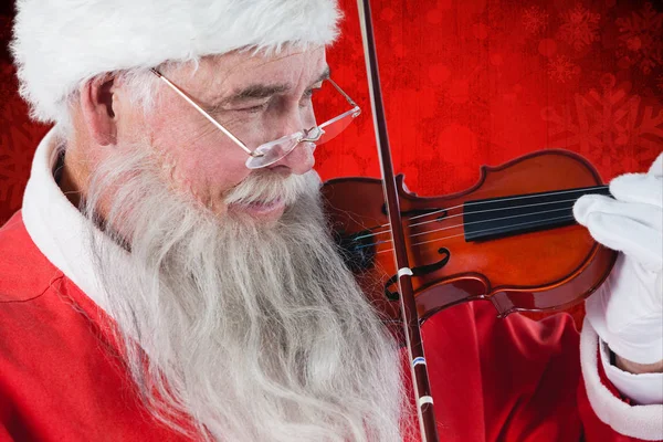 Kerstman spelen viool — Stockfoto