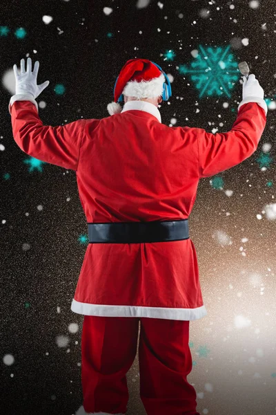 Santa claus listening to music — Stock Photo, Image