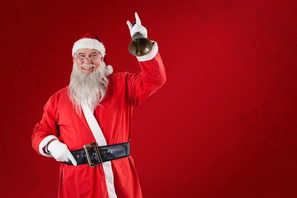 Papai Noel toca um sino — Fotografia de Stock