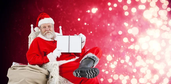 Santa Claus mostrando diario —  Fotos de Stock