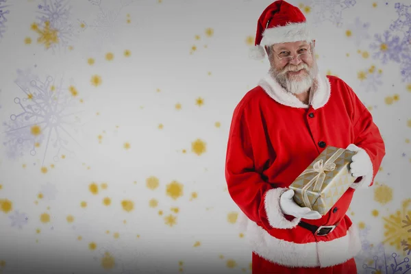 Санта-Клаус с рождественской подарочной коробкой — стоковое фото