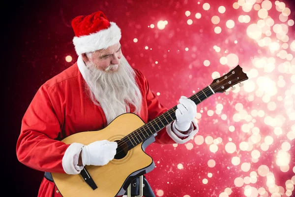 Papai Noel tocando guitarra — Fotografia de Stock